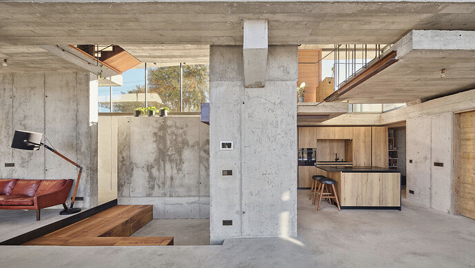 concrete-skin-casa-roble-continuous-curved-facade-madrid-terrain-muka-arquitectura-designboom-2
