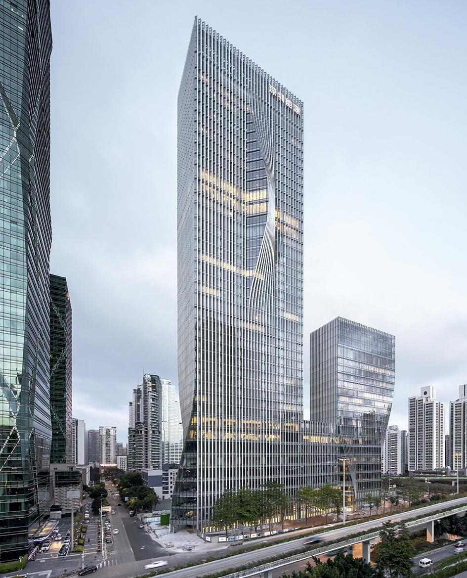 BIG's prisma towers subtly shimmer in the skyline of shenzhen