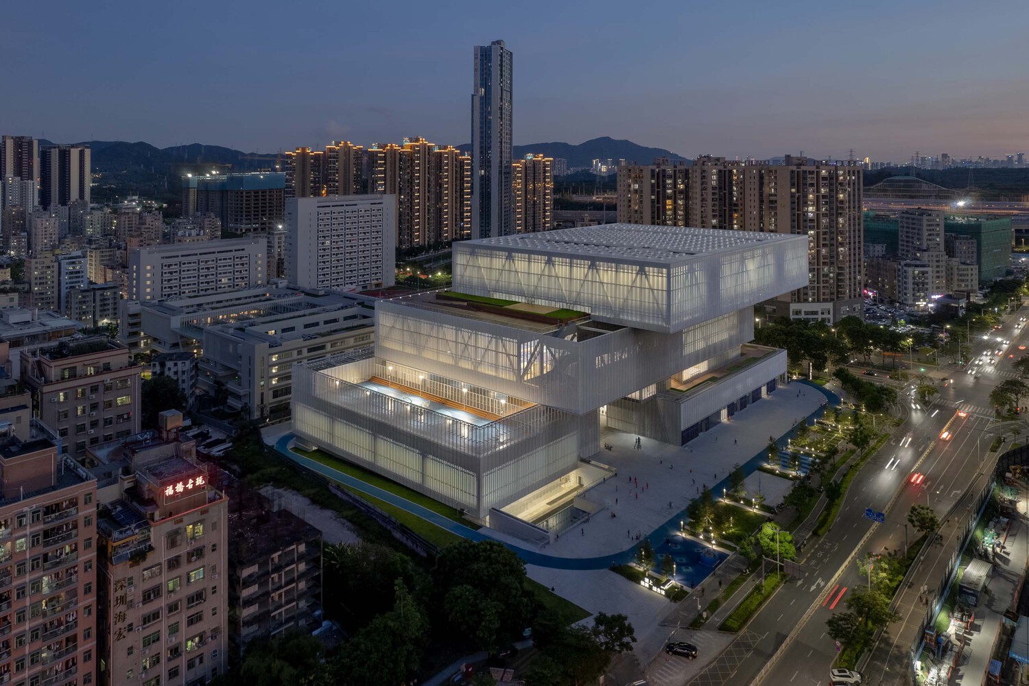 BIG's prisma towers subtly shimmer in the skyline of shenzhen